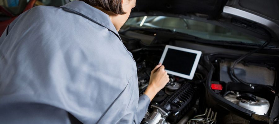 female-mechanic-using-diagnostic-tool (1) female-mechanic-using-diagnostic-tool (1)